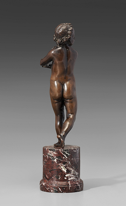 Dancing Boy Holding a Flute Slider Image 2